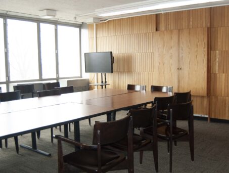 Conference table with chairs. Click on this picture to reserve this room.
